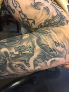 biker lawyer client tattoo